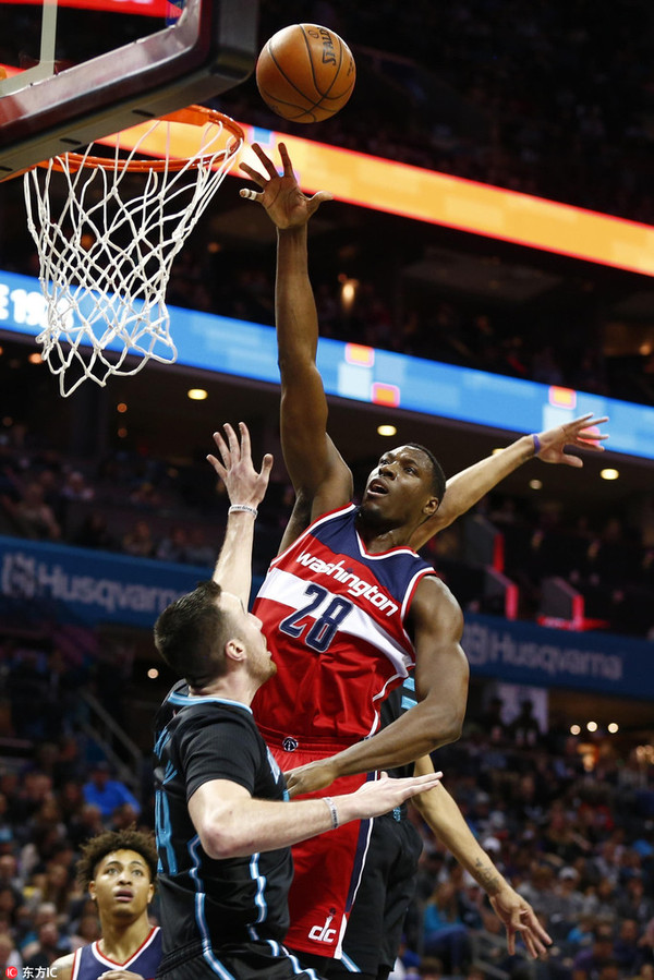  比尔全面表现奇才主场击败热火结束两连败颓势  